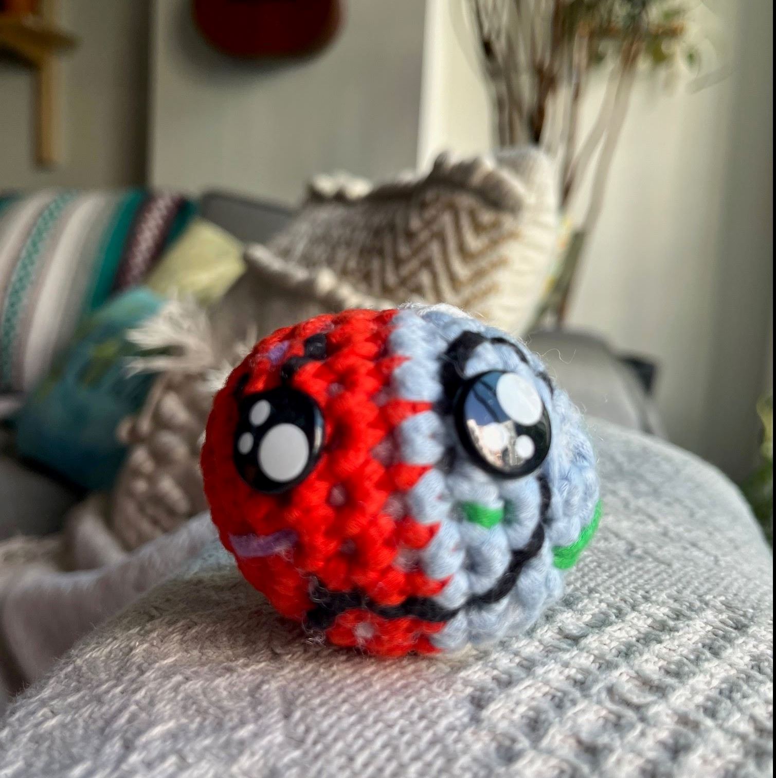 Crocheted earth with large eyes